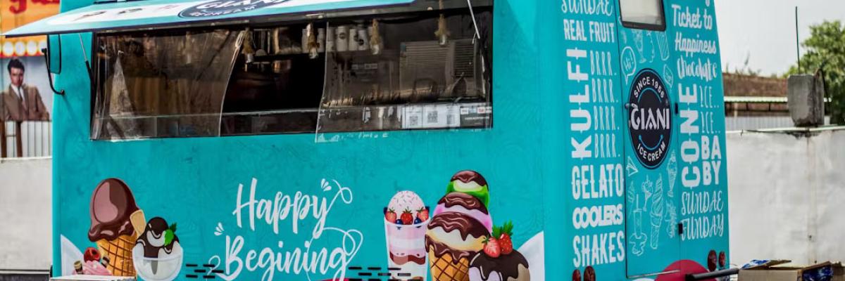Colourful Giani ice cream truck offering a variety of treats, including gelato, shakes, and sundaes, with playful 'Happy Beginning' signage.