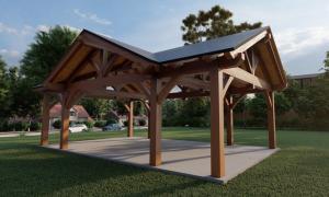 Picture of the pavilion which is the centerpiece of the park. A unique four-peak structure featuring large woof timber construction and indirect architectural lighting for nighttime safety and effect.
