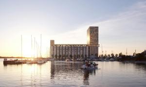 View across the water of Collingwood Terminals while the sunrises behind. 