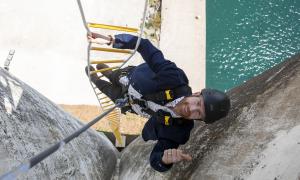 Jon Montgomery, host of The Amazing Race Canada participates in a challenge at the Collingwood Grain Terminals