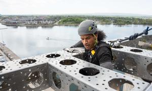 a contestant of the amazing race canada participates in a challenge at the Collingwood Grain Terminals