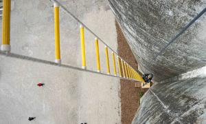 a contestant of the amazing race canada participates in a challenge at the Collingwood Grain Terminals