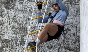 a contestant of the amazing race canada participates in a challenge at the Collingwood Grain Terminals