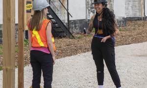a contestant of the amazing race canada participates in a challenge at the Collingwood Grain Terminals