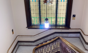 Staircase and stainglass window